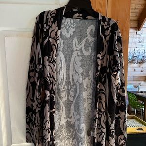 Pattern brown and tan sweater with sueded elbow patches